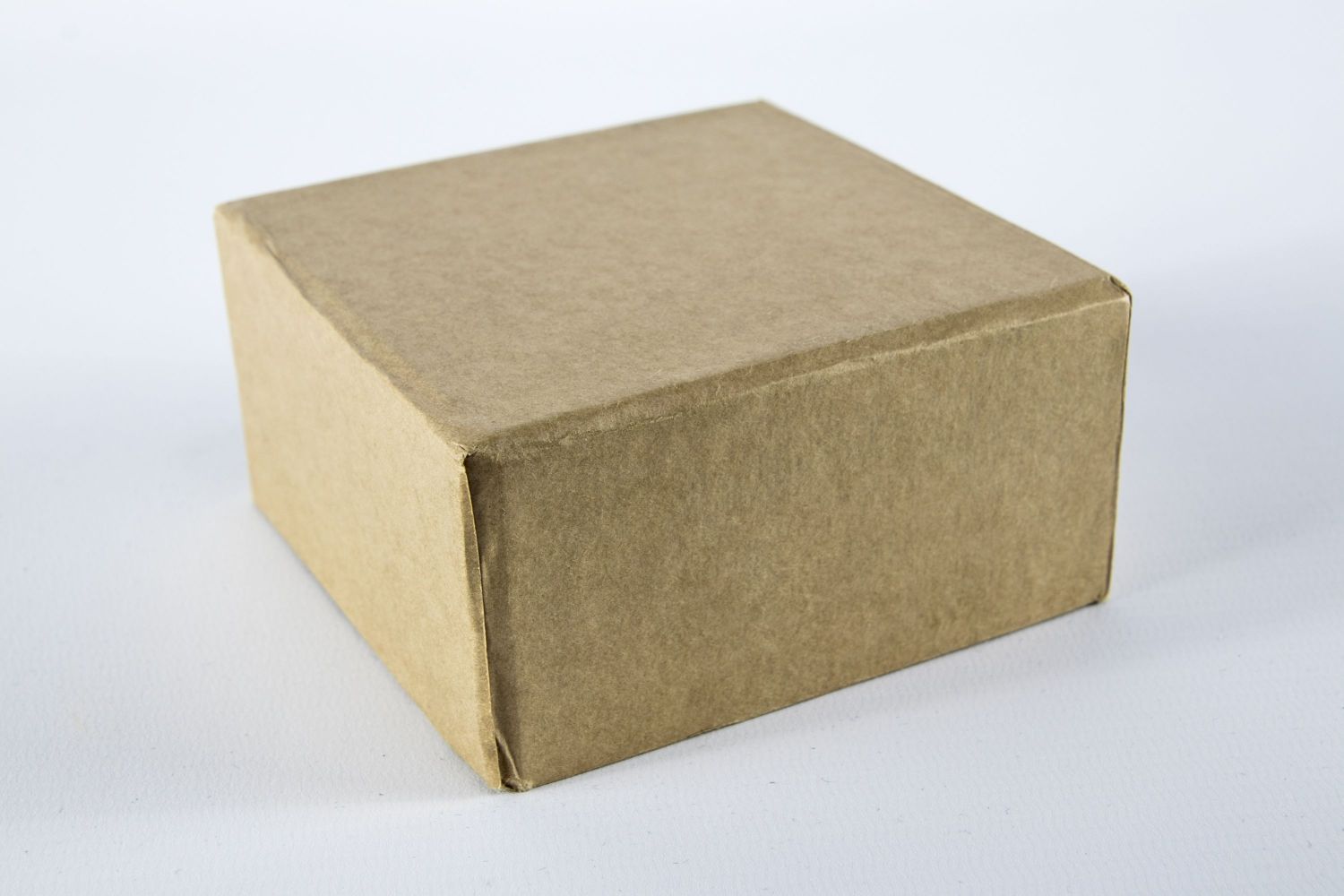 brown cardboard box on white surface - Can you travel with bread dough