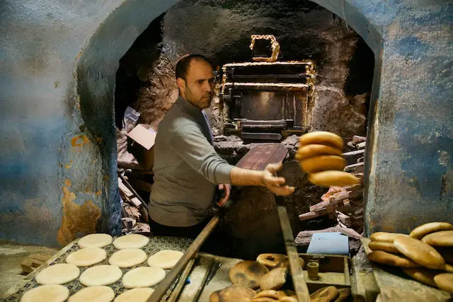 A Man Baking Bread Traditionally - Why does bread have so much sodium